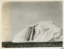 Image of Iceberg with two black marks on face